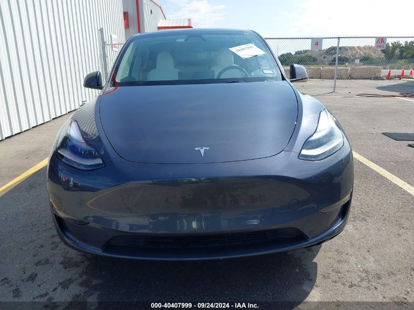 2023 Tesla Model Y Awd/Long Range Dual Motor All-Wheel Drive VIN: 7SAYGDEE2PA199025 Lot: 40407999