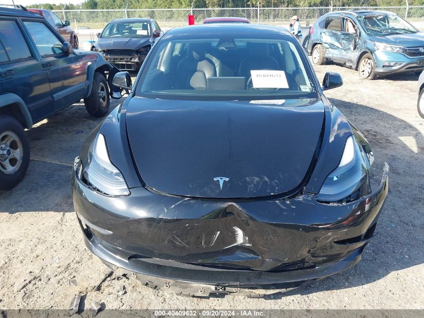 2021 Tesla Model 3 Standard Range Plus Rear-Wheel Drive VIN: 5YJ3E1EAXMF920991 Lot: 40409632