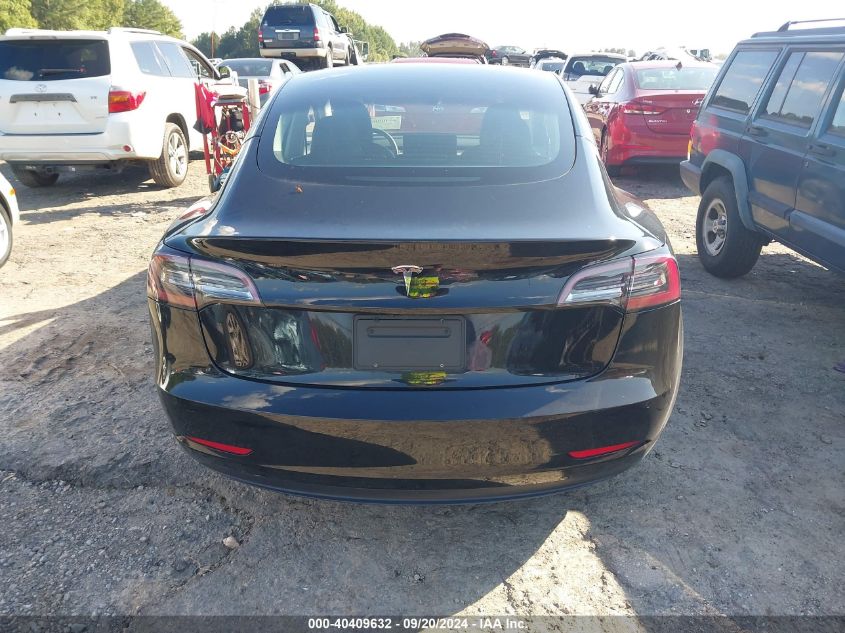 2021 Tesla Model 3 Standard Range Plus Rear-Wheel Drive VIN: 5YJ3E1EAXMF920991 Lot: 40409632