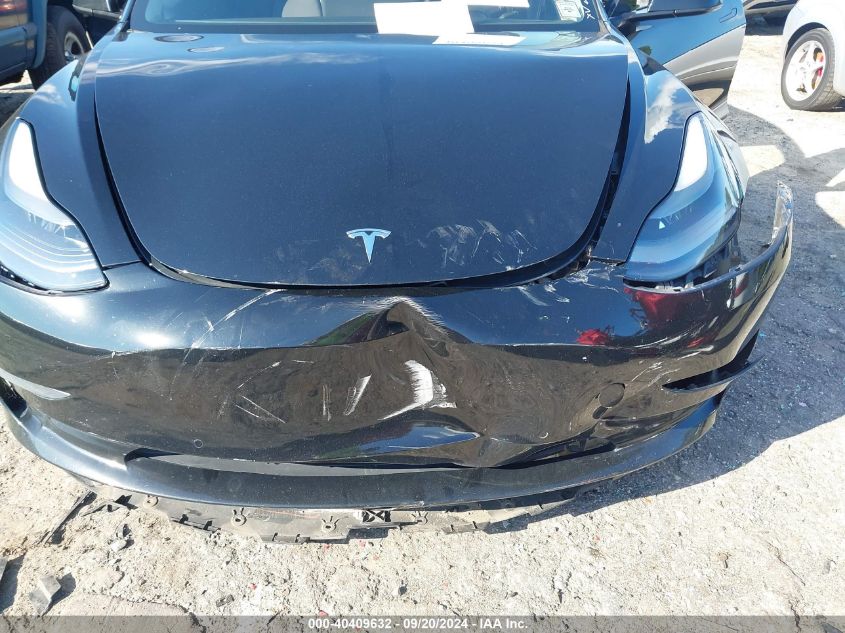 2021 Tesla Model 3 Standard Range Plus Rear-Wheel Drive VIN: 5YJ3E1EAXMF920991 Lot: 40409632