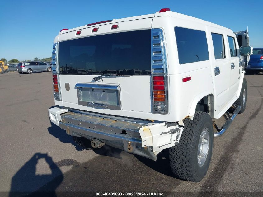 2003 Hummer H2 VIN: 5GRGN23U03H136935 Lot: 40409690