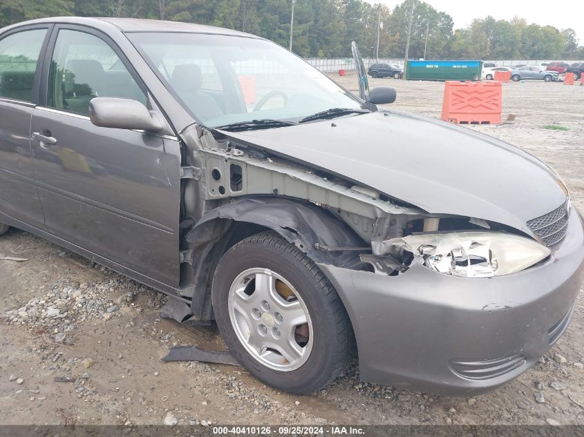 2003 Toyota Camry Le VIN: 4T1BF32K03U561797 Lot: 40410126