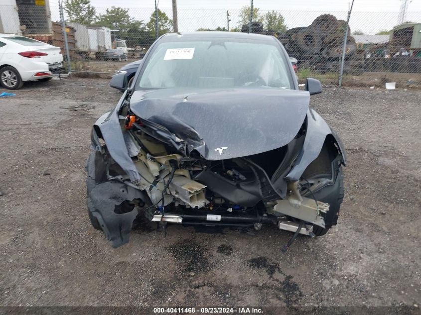 2023 Tesla Model Y Awd/Long Range Dual Motor All-Wheel Drive VIN: 7SAYGDEE4PF764121 Lot: 40411468