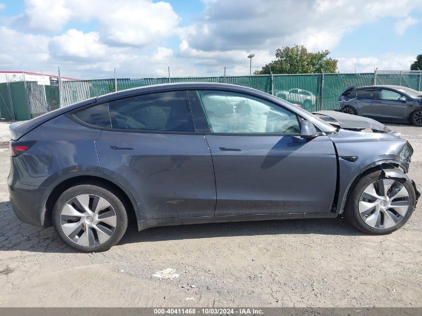 2023 Tesla Model Y Awd/Long Range Dual Motor All-Wheel Drive VIN: 7SAYGDEE4PF764121 Lot: 40411468