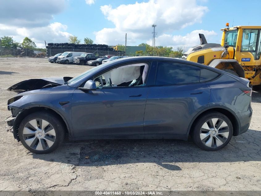 2023 Tesla Model Y Awd/Long Range Dual Motor All-Wheel Drive VIN: 7SAYGDEE4PF764121 Lot: 40411468