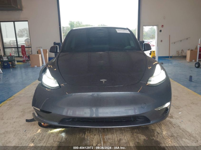 2023 Tesla Model Y Awd/Long Range Dual Motor All-Wheel Drive VIN: 7SAYGDEE7PF604184 Lot: 40412973