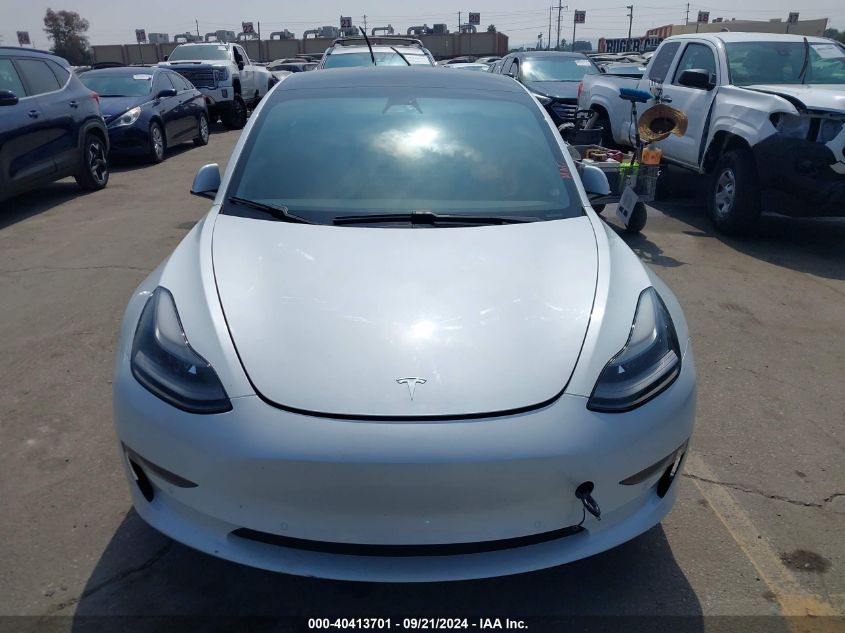 2021 Tesla Model 3 Standard Range Plus Rear-Wheel Drive VIN: 5YJ3E1EAXMF873932 Lot: 40413701