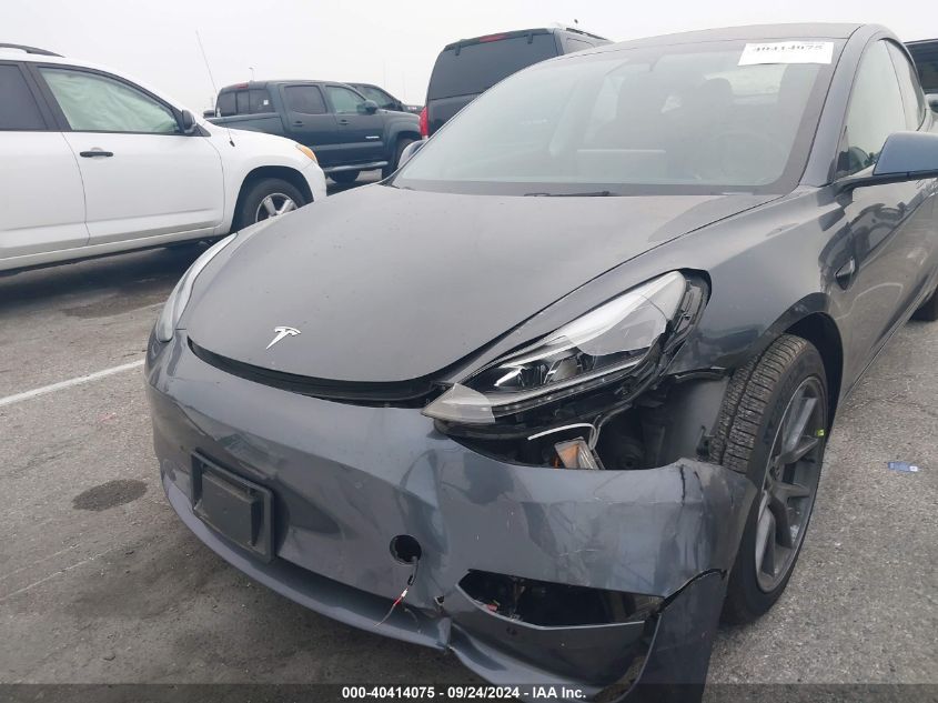 2021 Tesla Model 3 Standard Range Plus Rear-Wheel Drive VIN: 5YJ3E1EA5MF095412 Lot: 40414075