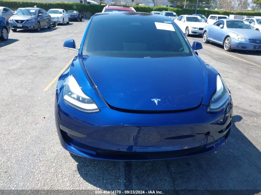 2018 Tesla Model 3 Long Range/Mid Range VIN: 5YJ3E1EA5JF110194 Lot: 40414370