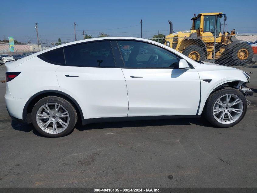 2023 Tesla Model Y Awd/Long Range Dual Motor All-Wheel Drive VIN: 7SAYGDEE2PF905557 Lot: 40416135