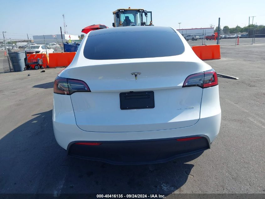 2023 Tesla Model Y Awd/Long Range Dual Motor All-Wheel Drive VIN: 7SAYGDEE2PF905557 Lot: 40416135