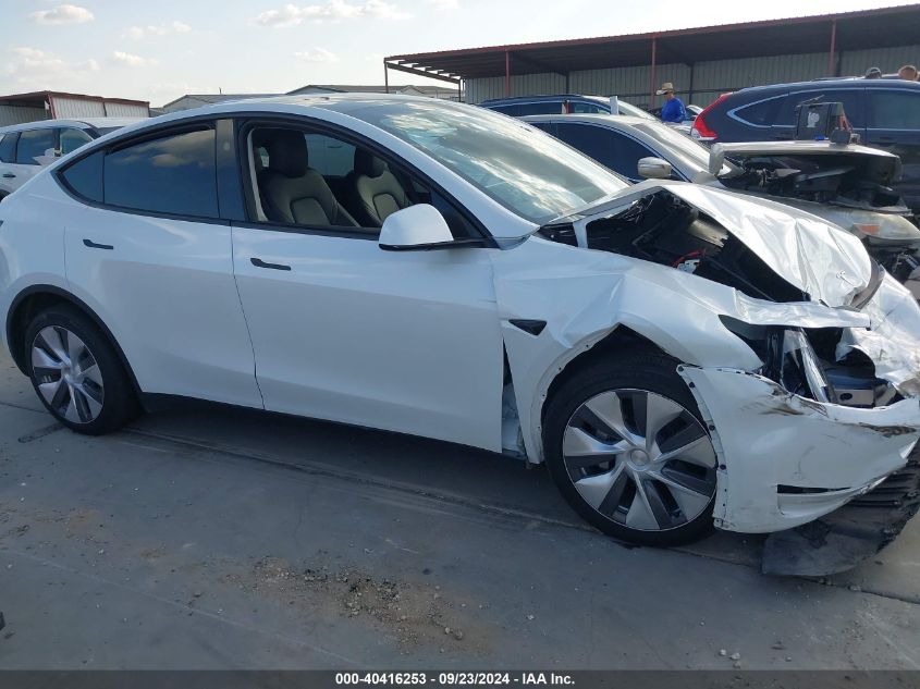 2023 Tesla Model Y Awd/Long Range Dual Motor All-Wheel Drive VIN: 7SAYGAEE1PF900011 Lot: 40416253