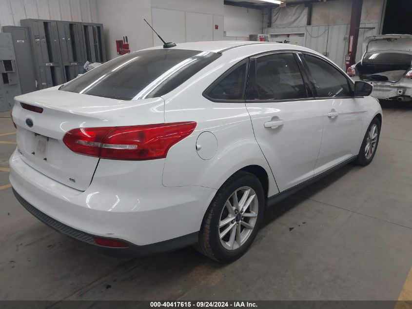 VIN 1FADP3F29FL203795 2015 Ford Focus, SE no.4