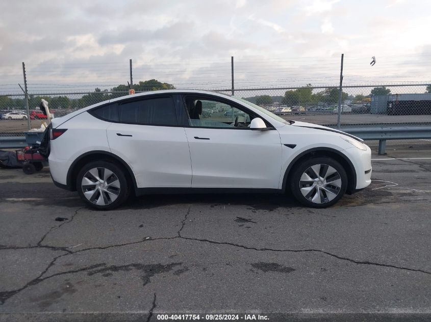 2023 Tesla Model Y Awd/Long Range Dual Motor All-Wheel Drive VIN: 7SAYGDEE0PF701260 Lot: 40417754