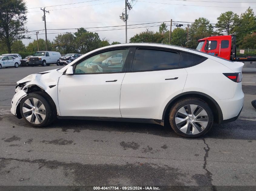 2023 Tesla Model Y Awd/Long Range Dual Motor All-Wheel Drive VIN: 7SAYGDEE0PF701260 Lot: 40417754