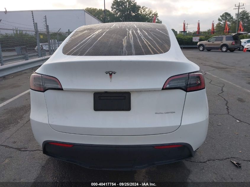 2023 Tesla Model Y Awd/Long Range Dual Motor All-Wheel Drive VIN: 7SAYGDEE0PF701260 Lot: 40417754