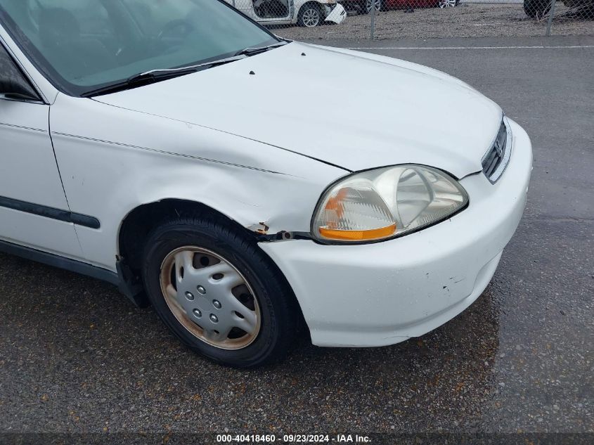 1HGEJ6671WL052000 1998 Honda Civic Lx