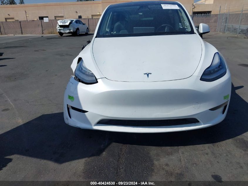 2023 Tesla Model Y Awd/Long Range Dual Motor All-Wheel Drive VIN: 7SAYGDEEXPA083359 Lot: 40424530