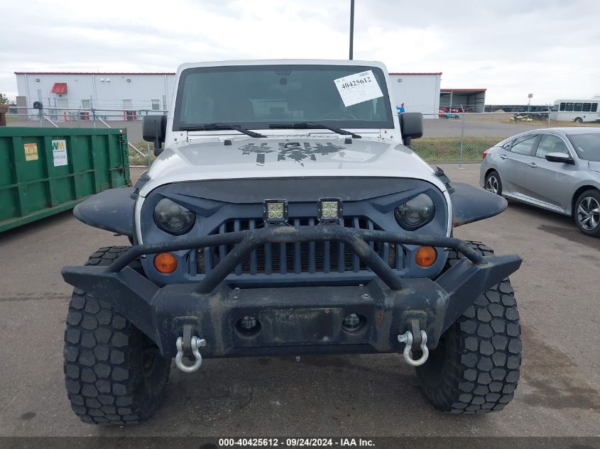 2011 Jeep Wrangler Unlimited Sahara VIN: 1J4BA5H16BL516181 Lot: 40425612