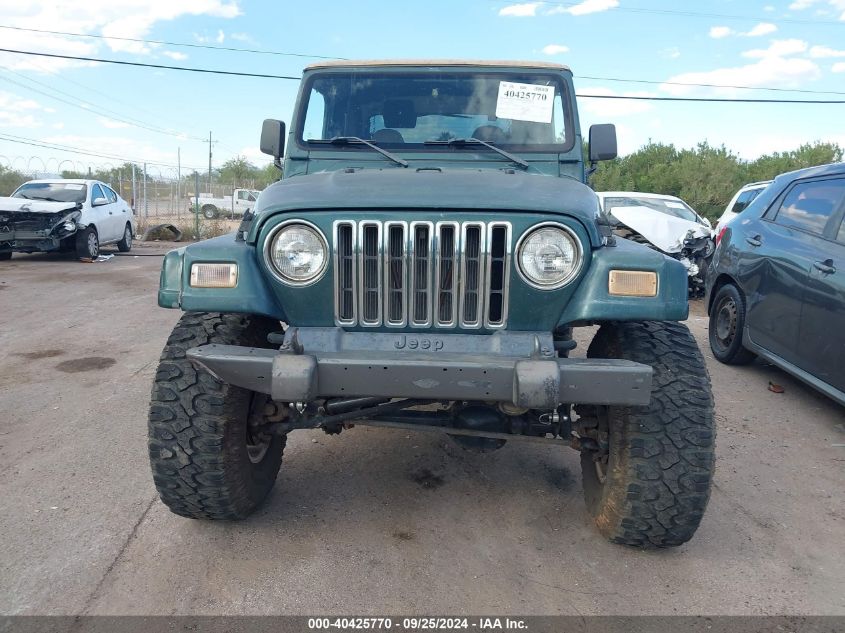 1999 Jeep Wrangler Sport VIN: 1J4FY19SXXP430613 Lot: 40425770