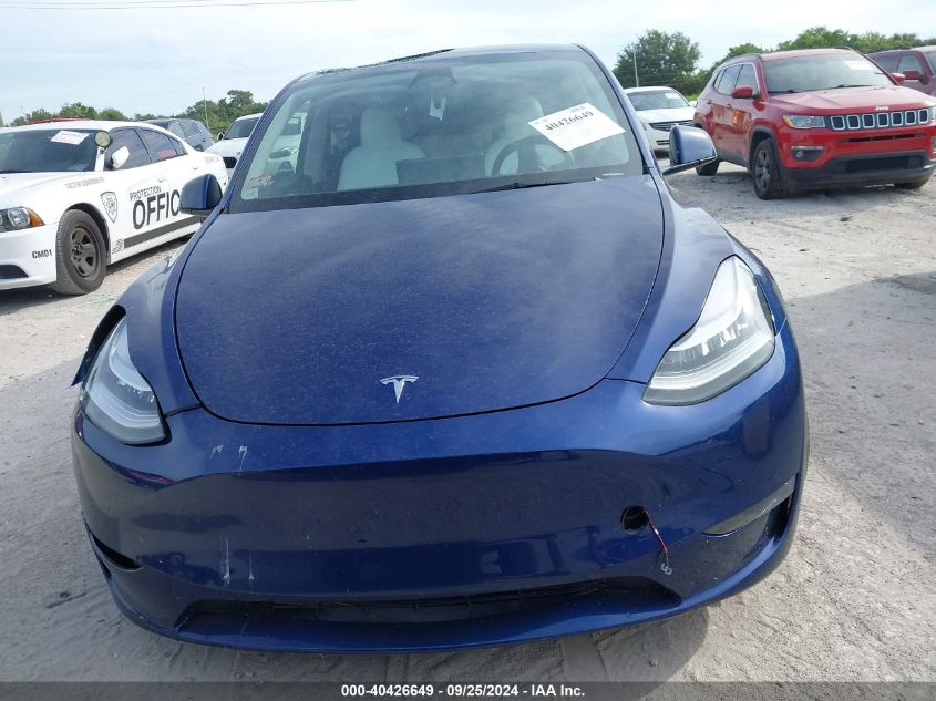 2023 Tesla Model Y Awd/Long Range Dual Motor All-Wheel Drive VIN: 7SAYGDEE4PA093661 Lot: 40426649