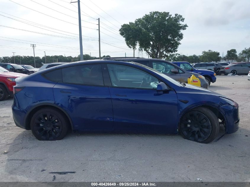 2023 Tesla Model Y Awd/Long Range Dual Motor All-Wheel Drive VIN: 7SAYGDEE4PA093661 Lot: 40426649