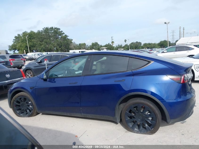 2023 Tesla Model Y Awd/Long Range Dual Motor All-Wheel Drive VIN: 7SAYGDEE4PA093661 Lot: 40426649