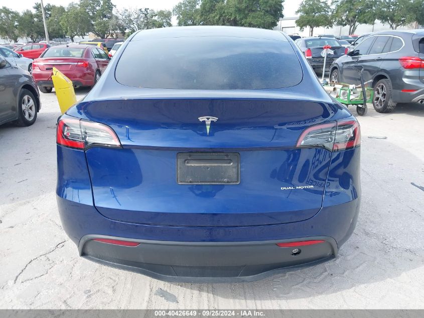 2023 Tesla Model Y Awd/Long Range Dual Motor All-Wheel Drive VIN: 7SAYGDEE4PA093661 Lot: 40426649