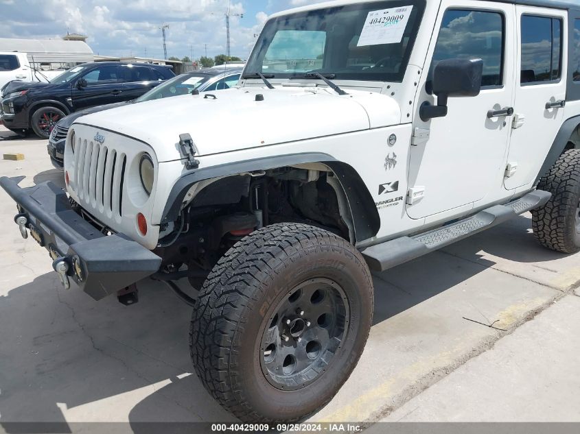 2009 Jeep Wrangler Unlimited X VIN: 1J8GA391X9L770686 Lot: 40429009