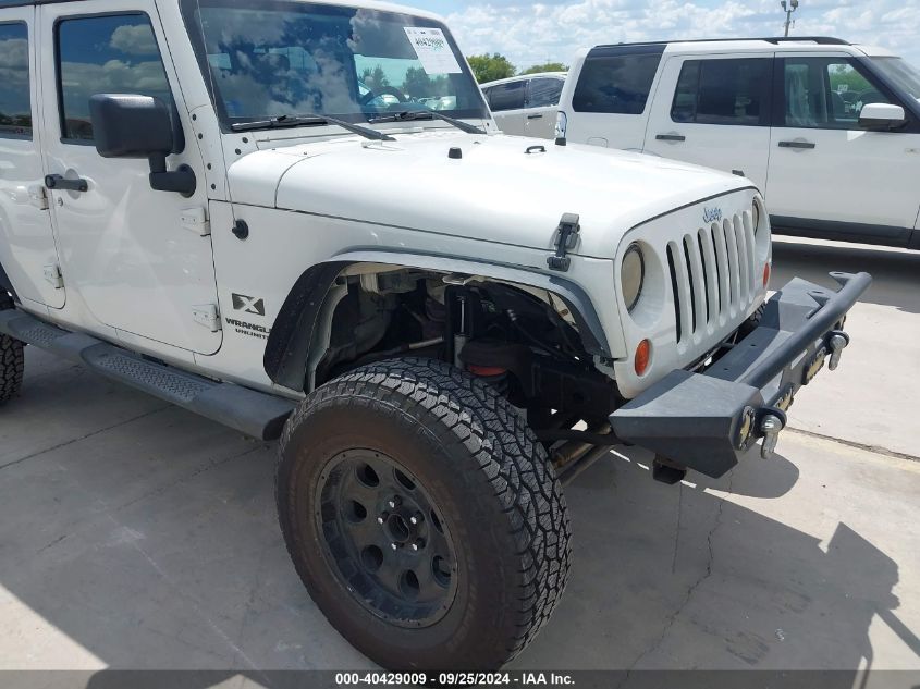 2009 Jeep Wrangler Unlimited X VIN: 1J8GA391X9L770686 Lot: 40429009