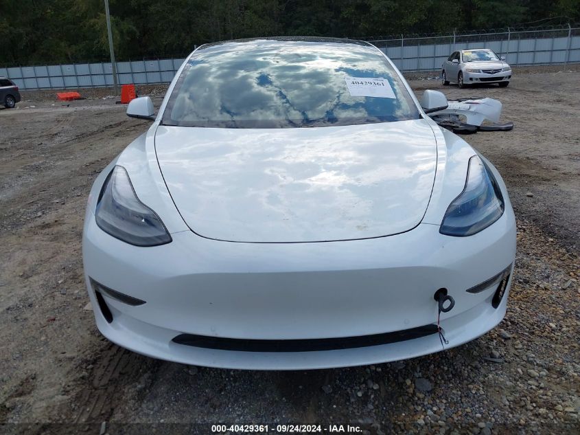 2021 Tesla Model 3 Standard Range Plus Rear-Wheel Drive VIN: 5YJ3E1EAXMF031690 Lot: 40429361