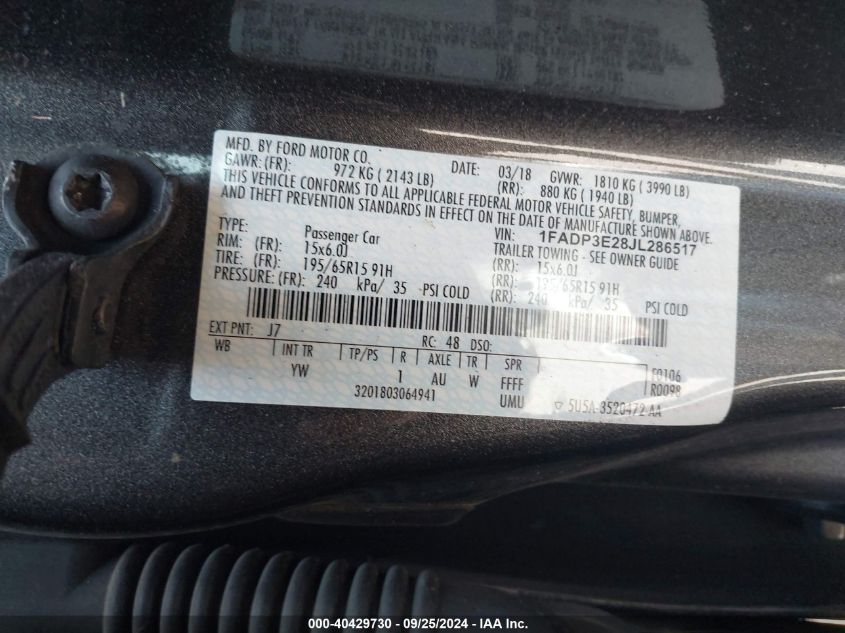 VIN 1FADP3E28JL286517 2018 FORD FOCUS no.9