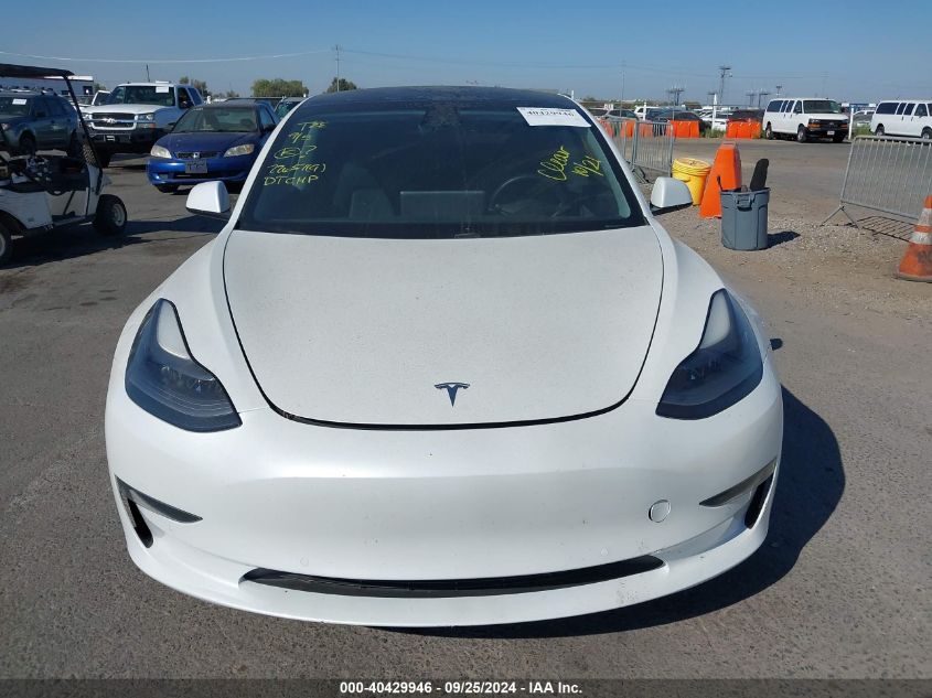 2021 Tesla Model 3 Standard Range Plus Rear-Wheel Drive VIN: 5YJ3E1EA7MF941409 Lot: 40429946