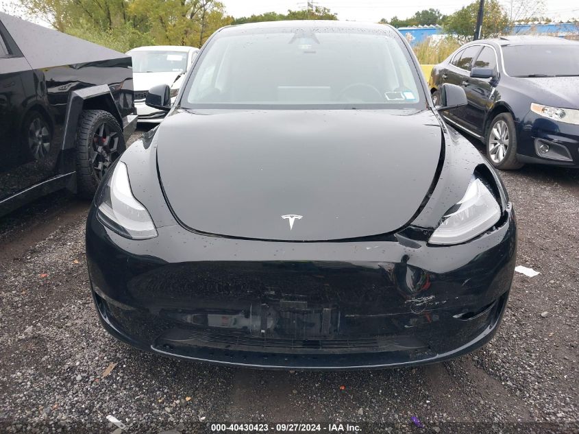 2023 Tesla Model Y Awd/Long Range Dual Motor All-Wheel Drive VIN: 7SAYGAEE1PF923367 Lot: 40430423