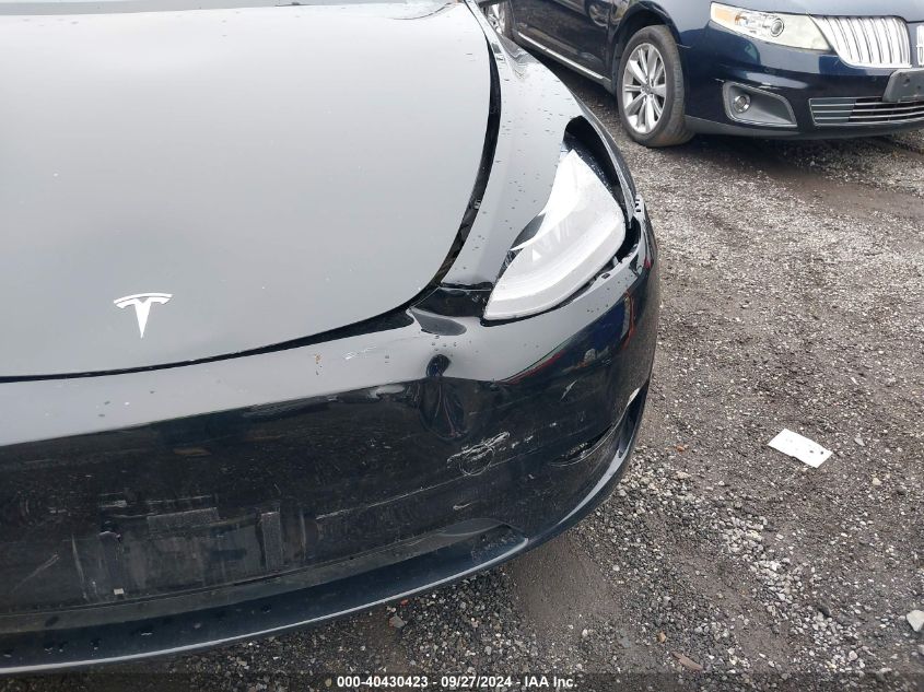 2023 Tesla Model Y Awd/Long Range Dual Motor All-Wheel Drive VIN: 7SAYGAEE1PF923367 Lot: 40430423