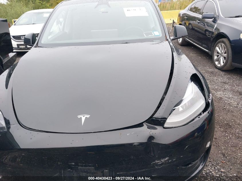 2023 Tesla Model Y Awd/Long Range Dual Motor All-Wheel Drive VIN: 7SAYGAEE1PF923367 Lot: 40430423