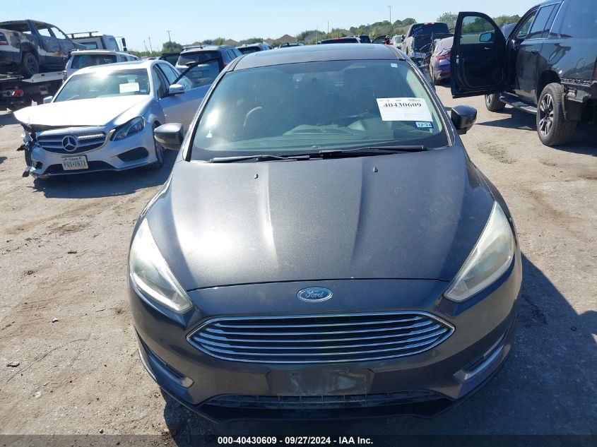 2016 Ford Focus Titanium VIN: 1FADP3N29GL302958 Lot: 40430609