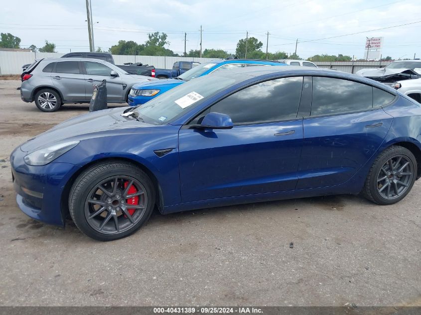 2022 Tesla Model 3 VIN: 5YJ3E1EAXNF188718 Lot: 40431389