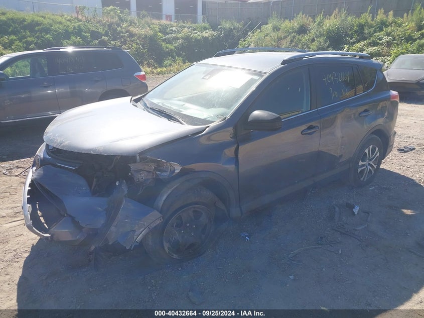 VIN JTMBFREV0JD243897 2018 TOYOTA RAV4 LE