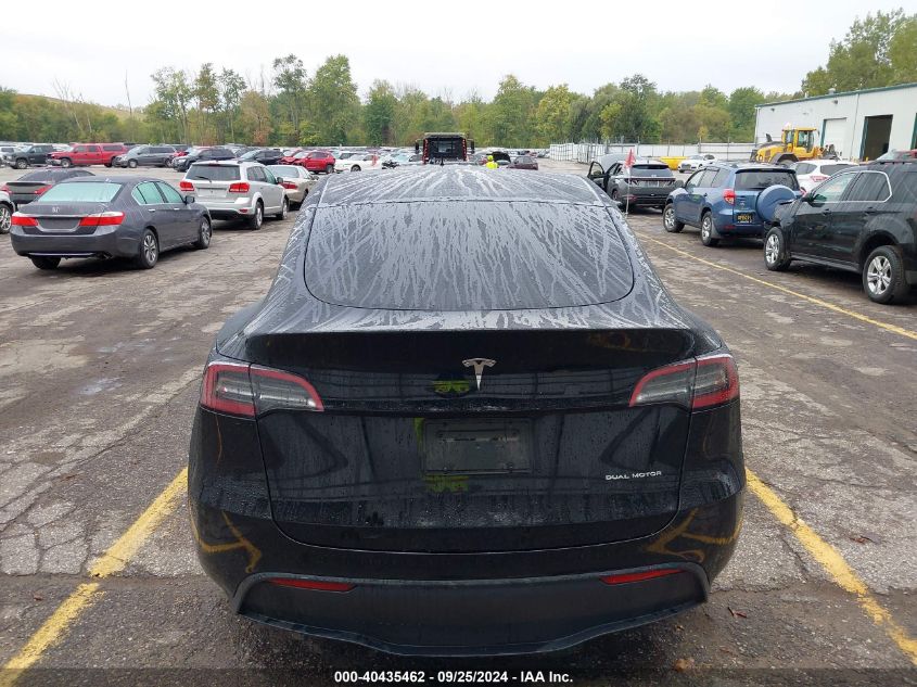 2023 Tesla Model Y Awd/Long Range Dual Motor All-Wheel Drive VIN: 7SAYGAEE1PF646140 Lot: 40435462