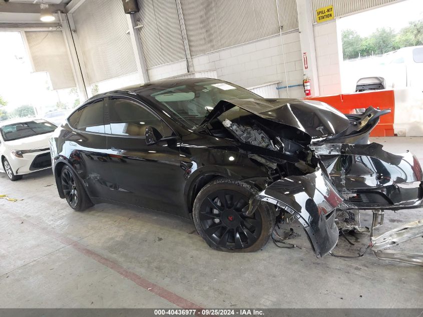 2023 Tesla Model Y Awd/Long Range Dual Motor All-Wheel Drive VIN: 7SAYGDEE2PA099457 Lot: 40436977