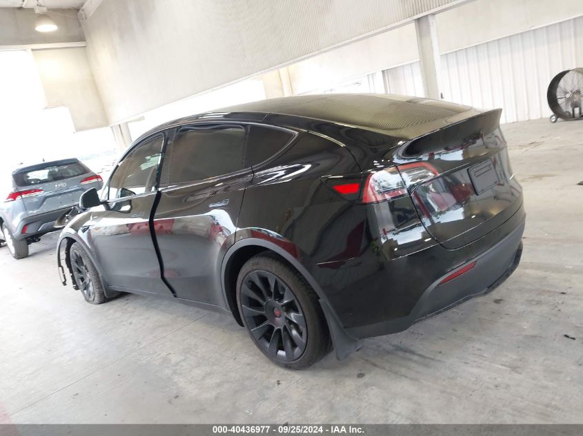 2023 Tesla Model Y Awd/Long Range Dual Motor All-Wheel Drive VIN: 7SAYGDEE2PA099457 Lot: 40436977