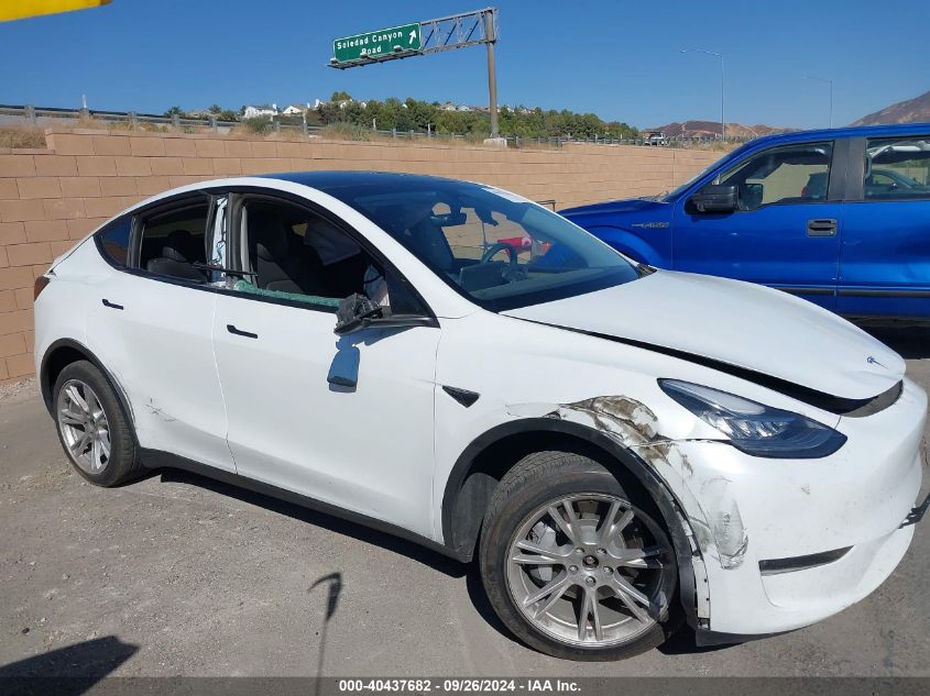 2023 Tesla Model Y Awd/Long Range Dual Motor All-Wheel Drive VIN: 7SAYGDEE7PA096067 Lot: 40437682