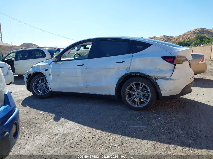 2023 Tesla Model Y Awd/Long Range Dual Motor All-Wheel Drive VIN: 7SAYGDEE7PA096067 Lot: 40437682