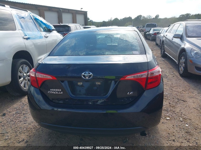VIN 5YFBURHE7KP938457 2019 TOYOTA COROLLA LE