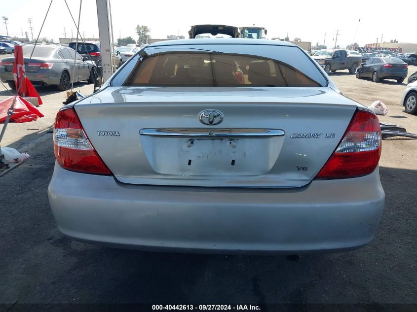 2004 Toyota Camry Le V6 VIN: 4T1BF32K74U581899 Lot: 40442613