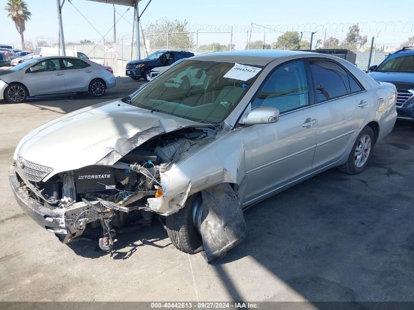 2004 Toyota Camry Le V6 VIN: 4T1BF32K74U581899 Lot: 40442613