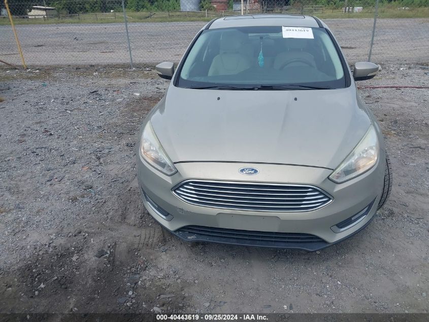 2016 Ford Focus Titanium VIN: 1FADP3N20GL302928 Lot: 40443619