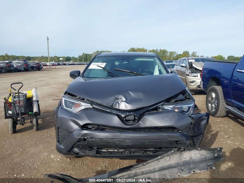 2018 Toyota Rav4 Le VIN: 2T3ZFREV1JW445536 Lot: 40447591