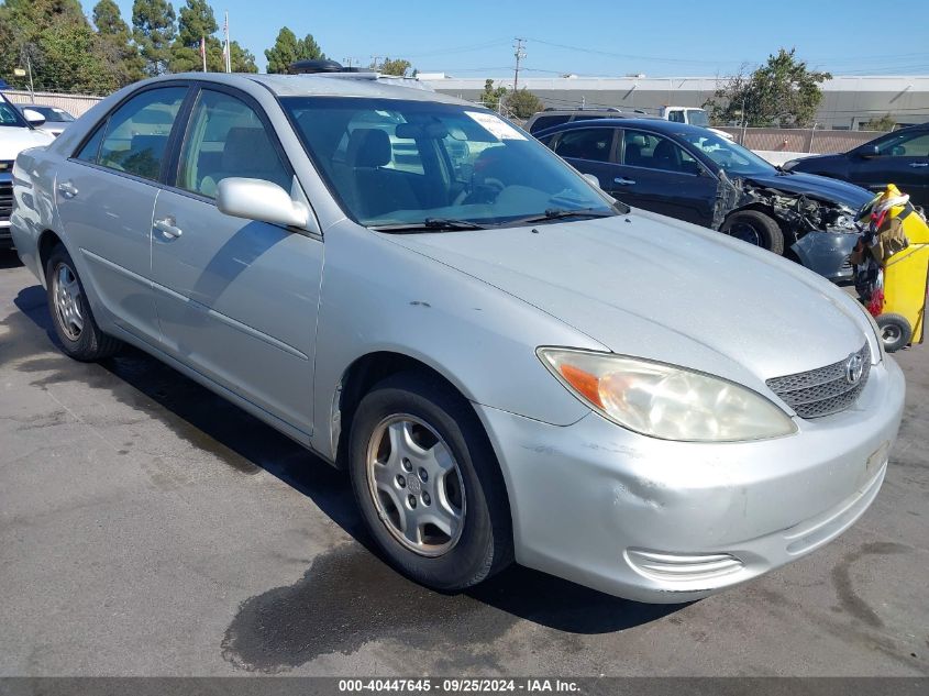 2003 Toyota Camry Le VIN: 4T1BF30K03U555940 Lot: 40447645